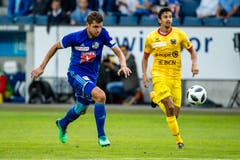 Laufduell zwischen Luzerns Pascal Schürpf (links) und Mike Gomes von Neuchâtel Xamax. Bild: Philipp Schmidli (Luzern, 21. Juli 2018)