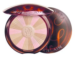 Bronzing Powder (etwa «Terracotta» von Guerlain um 65 Franken) deckt zwar nicht ab, gibt aber einen gesunden Hautton an den richtigen Stellen.