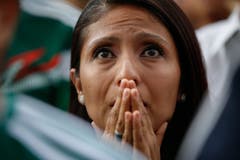 Ein mexikanischer Fan fiebert beim Public Viewing des Spiels von Mexico gegen Brasilien mit. (AP Photo/Anthony Vazquez, Mexico City, 2. Juli 2018)