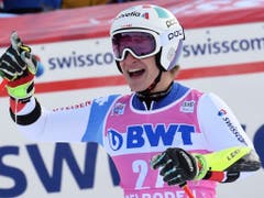 Marco Odermatt freut sich über sein zweitbestes Riesenslalom-Ergebnis (Bild: KEYSTONE/AP/MARCO TACCA)