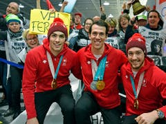 Das Schweizer Slalom-Team um Daniel Yule (links) und Ramon Zenhäusern (Mitte) hofft auf eine Medaille (Bild: KEYSTONE/WALTER BIERI)
