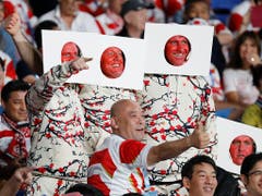 Die Herzen erobert: Japans Rugby-Fans sind überaus kreativ (Bild: KEYSTONE/AP/EUGENE HOSHIKO)