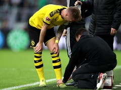 Sein Einsatz ist allerdings fraglich: Captain Marco Reus verletzte sich in der Meisterschaftspartie gegen Wolfsburg am Sprunggelenk (Bild: KEYSTONE/EPA/FRIEDEMANN VOGEL)
