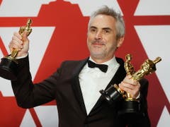 Der Mexikaner Alfonso Cuarón hat mit dem Werk «Roma» die wichtigen Oscar-Auszeichnungen für die beste Regie, die beste Kamera-Arbeit und als bester nicht-englischsprachiger Film gewonnen. (Bild: KEYSTONE/EPA/ETIENNE LAURENT)