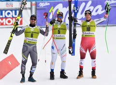 Das letzte Podest der Saison: Dominik Paris (Mitte) gewinnt vor Kjetil Jansrud (links) und Otmar Striedinger. (Bild: EPA/CHRISTIAN BRUNA)