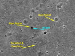 Die Aufnahme der Berner Mars-Kamera CaSSIS zeigt die Landezone des NASA-Landers «InSight». Das Bild umfasst eine Fläche von 2,25 mal 2,25 Kilometern in der Ebene Elysium Planitia nördlich des Mars-Äquators. (Bild: ESA/Roskosmos/CaSSIS)