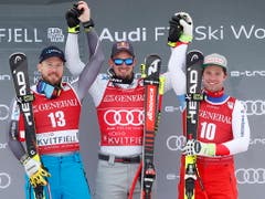 Sieger Dominik Paris in der Mitte zwischen Kjetil Jansrud (links) und dem drittklassierten Emmentaler Beat Feuz (Bild: KEYSTONE/EPA NTB SCANPIX/TERJE BENDIKSBY)