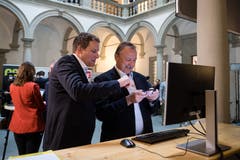 Kantonsratskandidat Thomas Meier (FDP, links).