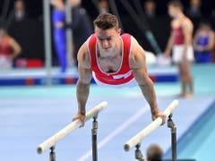 Christian Baumann erfüllte mit dem 6. Platz im Barrenfinal die Erwartungen (Bild: KEYSTONE/EPA PAP/MARCIN BIELECKI)