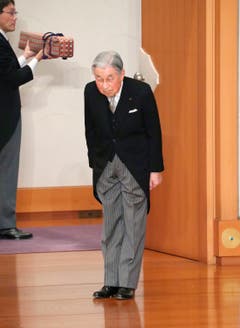(Bild: Japan Pool via AP)