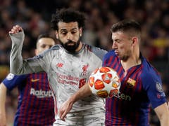 Neben Liverpools Superstar Mohamed Salah wirkt Clément Lenglet fast klein (Bild: Keystone/AP/Emilio Morenatti)