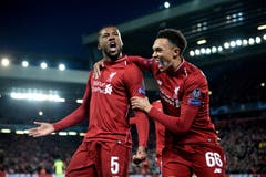 Georginio Wijnaldum (links) trifft in der 54. zum 2:0 und nur drei Minuten später zum 3:0. (Bild Peter Powell / EPA)