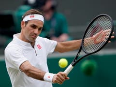 Roger Federer feierte gegen Kei Nishikori seinen 100. Sieg im Einzel in Wimbledon, den 186. in seiner Karriere auf Rasen (Bild: KEYSTONE/EPA/NIC BOTHMA)